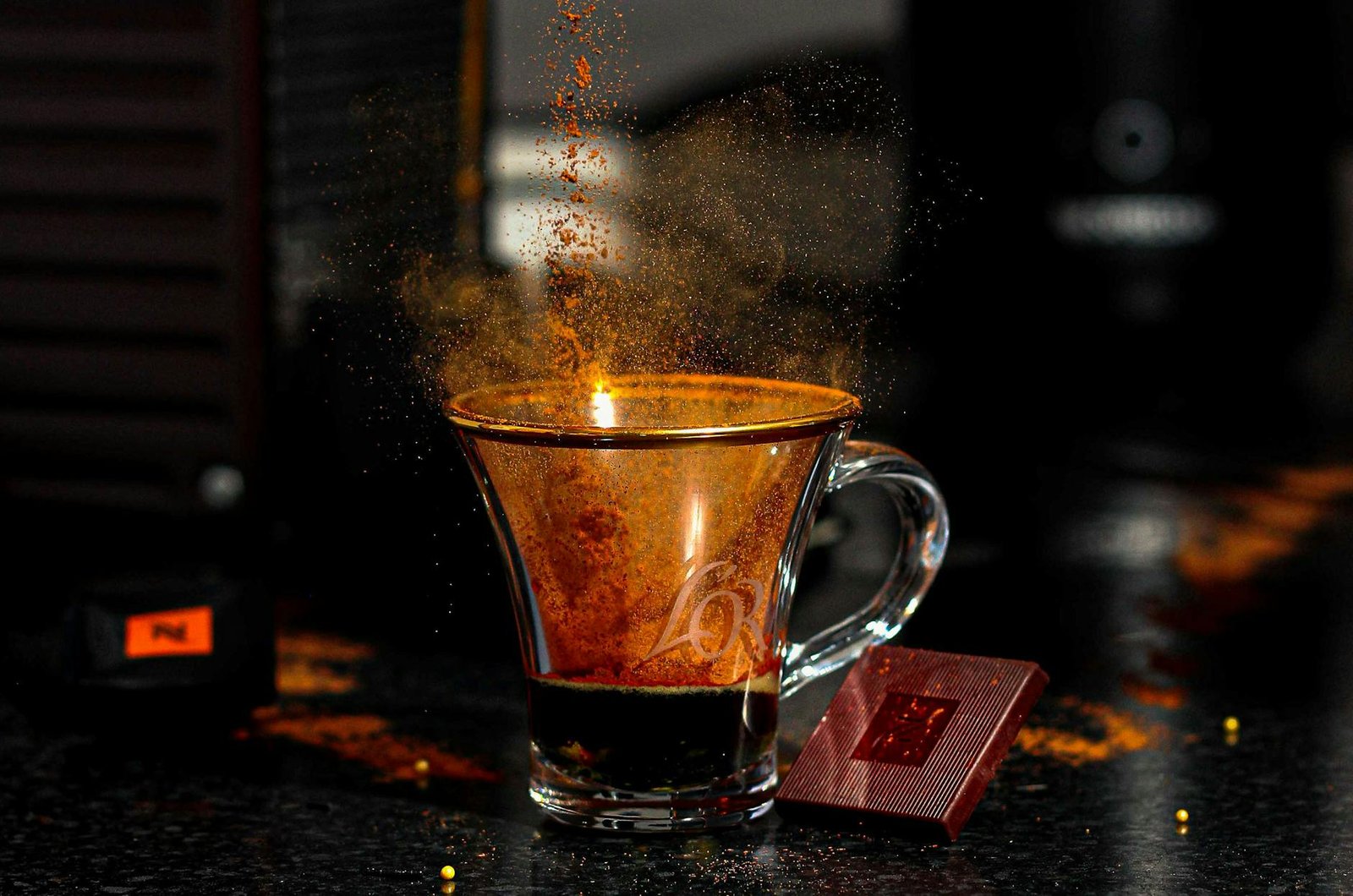 coffee powder in clear shot glass