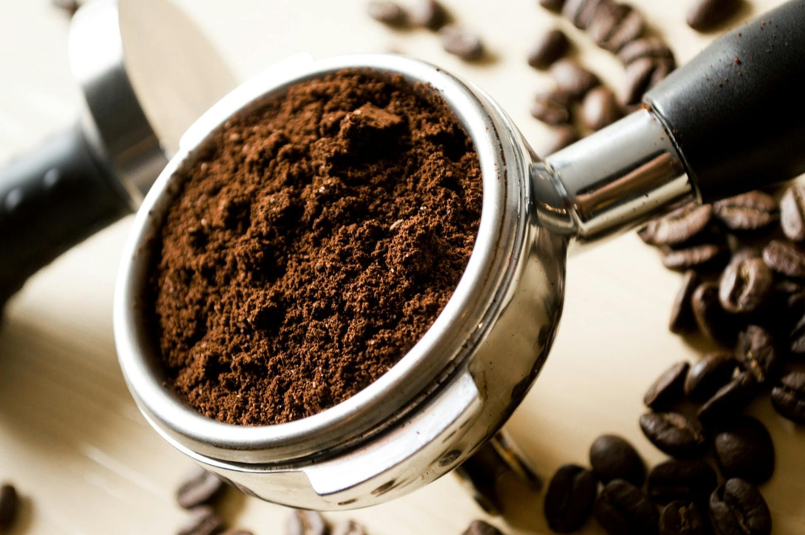 black coffee in stainless steel scoop